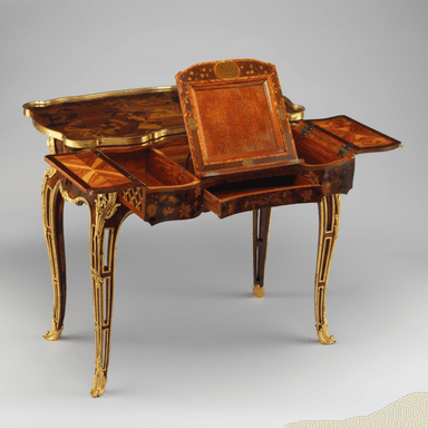 A Rococo-style marquetry table with cabriole legs and ornate gilt-bronze mounts. The table features a hinged central compartment with a mirror, flanked by pull-out drawers or compartments. The surface and sides are decorated with intricate floral marquetry and possibly painted inlays depicting scenic elements. The legs are slender and curved, terminating in elaborate gilt-bronze feet. — 3D model (AI enhanced source)