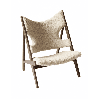 A contemporary lounge chair featuring a dark-stained wooden A-frame style base and a plush, cream-colored sheepskin upholstery for both the seat and backrest. The design is characterized by its relaxed posture and organic materials. — 3D model (AI enhanced source)