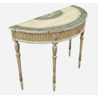 A semi-circular console table with a decorative painted surface. The table has fluted detailing on its apron and features four elaborately carved legs. The top surface is cream-colored with a central oval image, bordered by a green band with floral motifs and pink flowers. The legs are tapered and feature turned sections and carved acanthus leaf motifs. — 3D model (AI enhanced source)