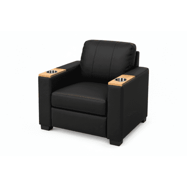 A modern black upholstered armchair featuring broad, square arms with integrated light wood inserts, each housing a circular metal cup holder. The chair has a plush seat cushion and a vertically tufted back cushion, resting on short, dark, rectangular block feet, giving it a stable and contemporary appearance. — 3D model (AI enhanced source)
