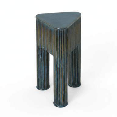 A striking accent table with a unique triangular top and three supporting columnar legs. The entire structure is characterized by a finely fluted, vertical texture and finished with a rich, verdigris blue-green patina that reveals hints of a golden-bronze undertone. The table is compact and designed as a standalone decorative piece. — 3D model (AI enhanced source)