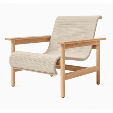 A modern armchair with a curved, woven seat and backrest, supported by a light-colored wooden frame. The frame features four legs, armrests, and a horizontal support connecting the front legs. The seat and back are constructed from tightly woven cord or rope in a neutral tone, creating a textured surface with visible horizontal lines. — 3D model (AI enhanced source)