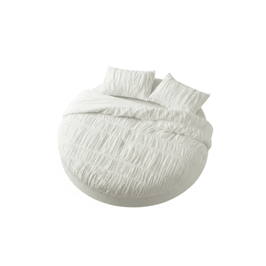 A top-down view of a circular platform bed adorned with a white shirred duvet cover and two matching shirred pillow shams. The bed base is a low-profile white circular platform, visible around the edges of the bedding. The bedding fabric exhibits a crinkled, textured appearance due to the shirring technique. — 3D model (AI enhanced source)