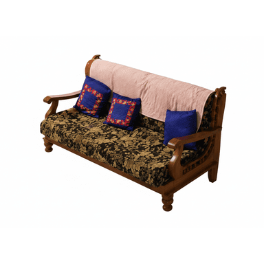 A traditional wooden sofa featuring a carved frame, dark floral pattern upholstery on the seat cushion, and accent pillows, partially covered by a light pink throw. — 3D model (AI enhanced source)