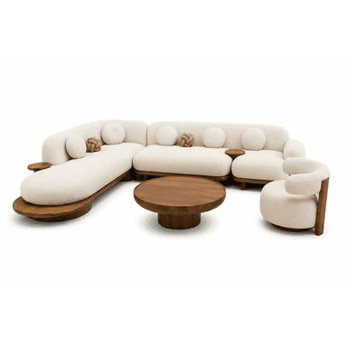 A modern living room furniture ensemble, consisting of a large, curvilinear modular sectional sofa upholstered in a light, textured boucle fabric. The sofa features integrated dark wood side tables and a matching dark wood platform base. Accompanying the sofa is a round coffee table, also made of dark wood, and a small, rounded accent chair upholstered in the same boucle fabric with a wooden base. Decorative round and knot-shaped pillows are placed on the sectional. — 3D model (AI enhanced source)