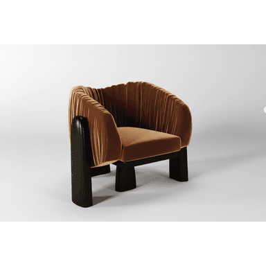 An upholstered lounge chair featuring a barrel-back design, covered in pleated burnt orange velvet, with integrated dark stained wood armrests and legs. — 3D model (AI enhanced source)