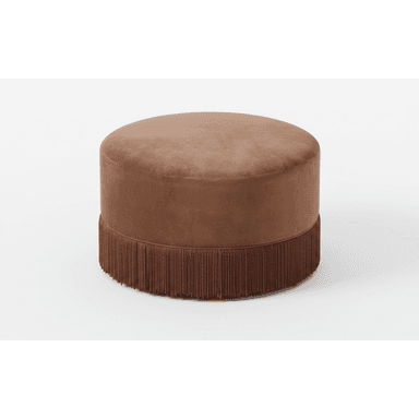 A contemporary round ottoman featuring plush velvet upholstery and a decorative fringe trim around its base. The piece has a solid, cylindrical form factor and is finished in a warm taupe-brown color. — 3D model (AI enhanced source)