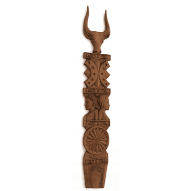 An intricately carved wooden wall panel, featuring a vertical arrangement of diverse designs including a bull's head, geometric patterns, human busts, and a circular relief. The natural wood grain is visible throughout. — 3D model (AI enhanced source)