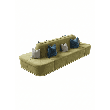 A long, modular, olive-green sofa with a curved, elongated form. The sofa is upholstered in a textured fabric and features segmented seating areas. It is accented with several throw pillows in varying shades of blue and grey. The base of the sofa has a thin, polished gold-colored trim that wraps around its perimeter. — 3D model (AI enhanced source)