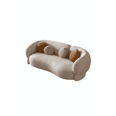 A contemporary curved sofa featuring a fluid, organic silhouette, fully upholstered in a light beige, subtly textured fabric. It has a continuous low-profile back and integrated armrests that seamlessly flow into the seating area. The sofa rests on an upholstered base, slightly elevated from the floor. Four round accent pillows in complementary earthy tones are placed along the backrest. — 3D model (AI enhanced source)
