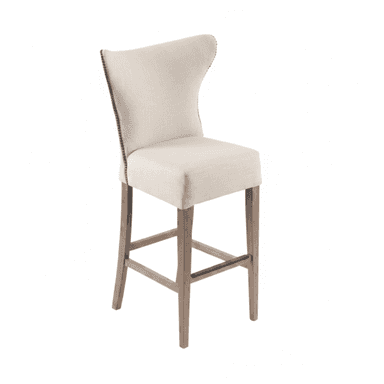 A cream-colored upholstered bar stool featuring a winged backrest and nailhead trim detailing. The stool stands on four tapered wooden legs connected by crossbars, one of which includes a metal footrest. The design appears sturdy and classic. — 3D model (AI enhanced source)