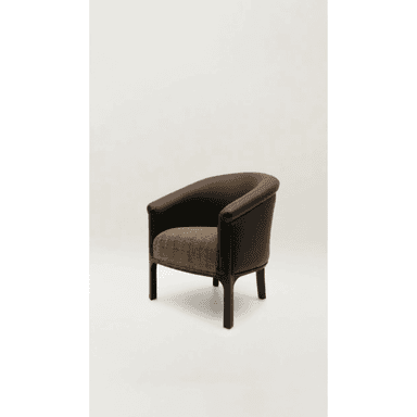 A modern tub armchair featuring a continuous, rounded back and armrest upholstered in dark brown, with a contrasting textured fabric seat in shades of beige and brown. It stands on four sturdy dark-stained wooden legs. — 3D model (AI enhanced source)