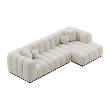 An off-white or cream-colored modular sectional sofa featuring distinctive channel tufting across all seating surfaces and backrests. The sofa is composed of multiple segments, including a long straight section and a corner chaise lounge, allowing for a versatile L-shaped configuration. Its design is characterized by soft, rounded edges and a low-profile, recessed dark wood or metal base. The sofa includes two matching boucle throw pillows, one square and one round, enhancing its plush appearance. — 3D model (AI enhanced source)
