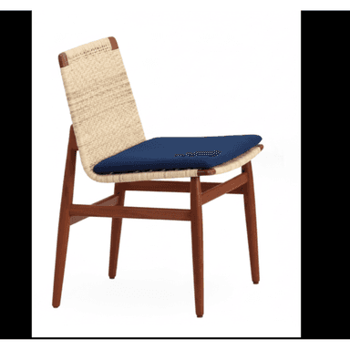 A minimalist dining chair featuring a warm-toned wooden frame, likely teak, with a tightly woven paper cord seat and backrest. A removable navy blue fabric cushion provides additional comfort on the seat. The chair exhibits clean lines and tapered legs characteristic of Mid-Century Modern design. — 3D model (AI enhanced source)