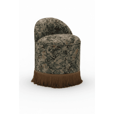 An upholstered round back chair or vanity stool featuring a distinctive multi-color patterned fabric. The chair has a curved backrest, a circular seat, and a cylindrical base, which is fully covered and adorned with a long, decorative fringe around its bottom edge. No legs are visible. — 3D model (AI enhanced source)