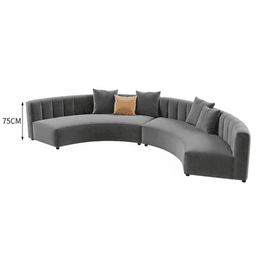 A contemporary curved sectional sofa upholstered in grey velvet, featuring channel tufting on the backrests. The sofa is composed of two modular pieces that form a crescent shape, providing ample seating. It rests on discreet, low-profile feet and comes with several matching grey throw pillows and one contrasting light brown throw pillow. — 3D model (AI enhanced source)