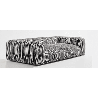 A contemporary two-seater sofa featuring a distinctive black and white zebra stripe pattern upholstery. The sofa has a boxy, low-profile silhouette with integrated armrests and backrest, presenting a seamless upholstered form without visible legs. Its design emphasizes comfort and a bold aesthetic statement. — 3D model (AI enhanced source)