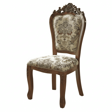 An ornate traditional dining side chair featuring a dark brown carved wood frame and upholstered seat and back. The chair exhibits classical design elements, including an elaborately carved crest rail and cabriole front legs with detailed acanthus leaf carvings. Both the seat and the backrest are upholstered in a patterned fabric, likely a jacquard or tapestry, featuring a multi-color floral motif on a light background, finished with decorative nailhead trim along the edges. — 3D model (AI enhanced source)