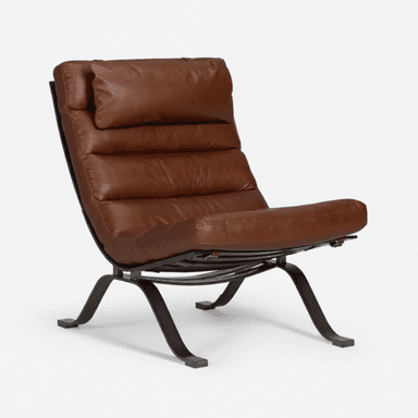 A low-slung lounge chair featuring a dark, possibly black or dark bronze, metal frame and thick, horizontally ribbed brown leather cushions. The cushions provide seating for the back, seat, and an integrated headrest. The metal frame is elegantly curved, forming the support structure for the comfortable seating elements, and appears to rest on flat, rectangular feet. — 3D model (AI enhanced source)