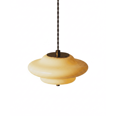 A ceiling-mounted pendant light featuring a multi-tiered, saucer-shaped shade crafted from opalescent glass. The shade consists of two main stacked sections, with the larger, shallower section above a smaller, more rounded section, creating a layered, diffused lighting effect. It is suspended by a twisted dark textile electrical cord, connected to the fixture with a discreet brass mounting plate at the top of the shade. — 3D model (AI enhanced source)