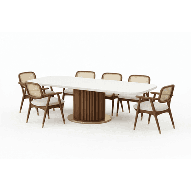 A contemporary dining set featuring an oval white tabletop, supported by a fluted cylindrical wooden pedestal base with a brass accent plate. The set includes six dining chairs with curved wooden frames, natural cane backrests, and upholstered light-colored seats, finished with brass caps on their tapered legs. — 3D model (AI enhanced source)