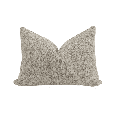 A textured pillow with a speckled pattern, featuring a neutral color palette. It is designed with a slight taper towards the corners, giving it a classic lumbar pillow shape. The fabric appears to be a woven textile. — 3D model (AI enhanced source)