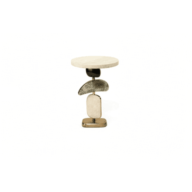 A small, round-top accent table featuring a distinctive sculptural base composed of stacked organic shapes in varied materials and finishes, resting on a polished brass plinth. — 3D model (AI enhanced source)
