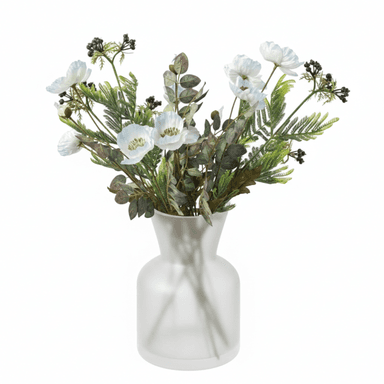 A decorative arrangement featuring a bouquet of white artificial poppy-like flowers, green fern-like foliage, reddish-green eucalyptus-like leaves, and dark faux berries, all contained within a contemporary frosted glass vase. — 3D model (AI enhanced source)