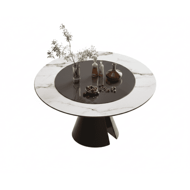 A contemporary round dining table featuring a white marble-patterned top with grey veining, a central dark, glossy rotating surface (lazy Susan), and a dark, sculptural pedestal base with a unique cut-out design. — 3D model (AI enhanced source)