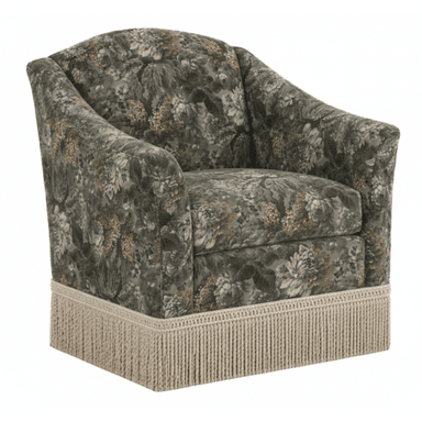 A fully upholstered armchair with a rounded back and arms, featuring a dense floral pattern in green, brown, and cream tones. The base of the armchair is adorned with a thick, beige fringe. The overall form suggests a classic or transitional style. — 3D model (AI enhanced source)