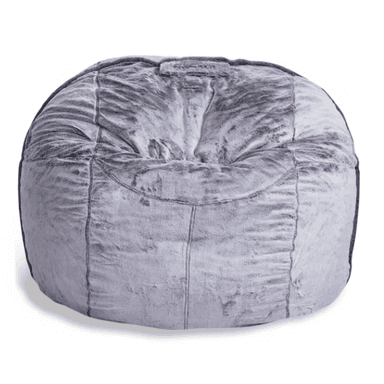A round, amorphous bean bag chair upholstered in a grey, mottled faux fur fabric, featuring visible stitching that creates a segmented appearance. A small fabric handle is present at the top. — 3D model (AI enhanced source)