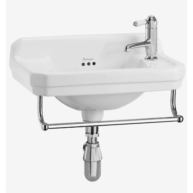 A white ceramic wall-mounted bathroom sink featuring an integrated chrome towel rail and a single-hole chrome mixer faucet with a white ceramic lever handle. The sink includes an exposed chrome P-trap and an overflow drain. The design is traditional, with stepped edges and a curved basin. — 3D model (AI enhanced source)