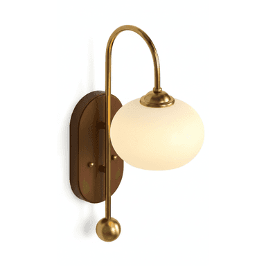 A wall-mounted lighting fixture featuring a curved brass arm extending from an oval wooden backplate. The arm supports a spherical opal glass shade that emits a warm, diffused light. A decorative brass finial adorns the bottom end of the brass arm, completing the elegant design. — 3D model (AI enhanced source)
