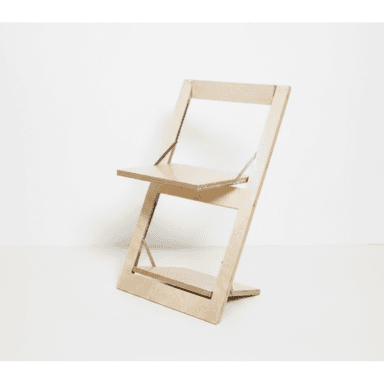A modern, minimalist folding chair constructed from light-toned plywood, featuring a distinctive Z-shaped frame. The seat and backrest are flat panels, and metal hinges are visible at the pivot points, indicating its collapsible design. The chair has a clean, natural wood finish. — 3D model (AI enhanced source)