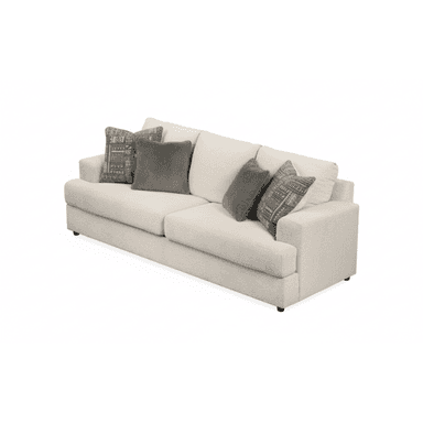 A modern three-seater sofa upholstered in a light beige textured fabric, featuring clean lines, wide block arms, and removable seat and back cushions. It comes with four accent throw pillows in varying patterns and solid gray, complementing its contemporary aesthetic. The sofa sits on discreet, short black feet, giving it a low-profile stance. — 3D model (AI enhanced source)