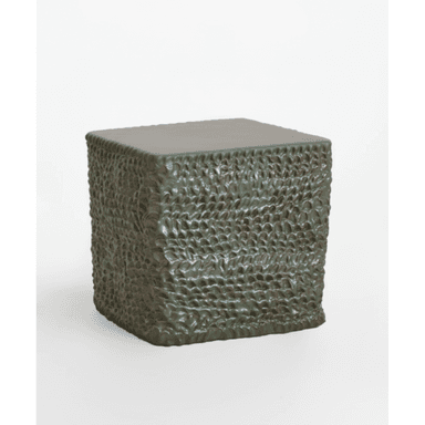 A cube-shaped accent table featuring a heavily textured surface with a dark green, mottled glaze, and a flat, smooth top. — 3D model (AI enhanced source)