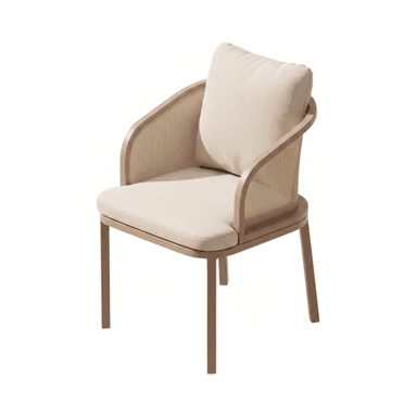 A contemporary armchair featuring a metal frame with a light brown, wood-look finish. The backrest incorporates a natural cane webbing panel, complemented by a separate upholstered back cushion and seat cushion in textured beige fabric. The chair stands on four straight, square-profile legs and has gracefully curved armrests. — 3D model (AI enhanced source)