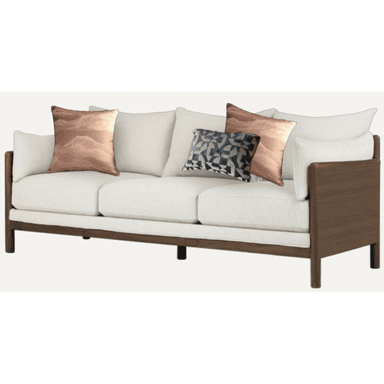 A three-seater sofa featuring a prominent exposed dark wood frame, light cream fabric upholstery, and multiple loose seat and back cushions, accented with decorative throw pillows. — 3D model (AI enhanced source)