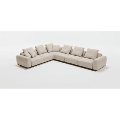 An L-shaped modular sectional sofa, upholstered in a light beige fabric, featuring a minimalist design with a low-profile, recessed dark plinth base. The sofa is composed of multiple individual units arranged in a corner configuration, providing extensive seating. It includes numerous loose back cushions and throw pillows, enhancing comfort and aesthetic appeal. The overall appearance is modern and clean-lined. — 3D model (AI enhanced source)