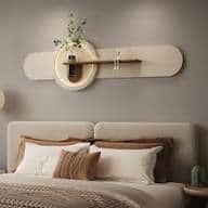 A modern wall-mounted shelving unit featuring an elongated, rounded back panel in a light color, wit… — 3D model
