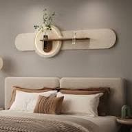 A modern wall-mounted shelving unit featuring an elongated, rounded back panel in a light color, with an integrated circular illuminated element and a wooden shelf. — 3D model