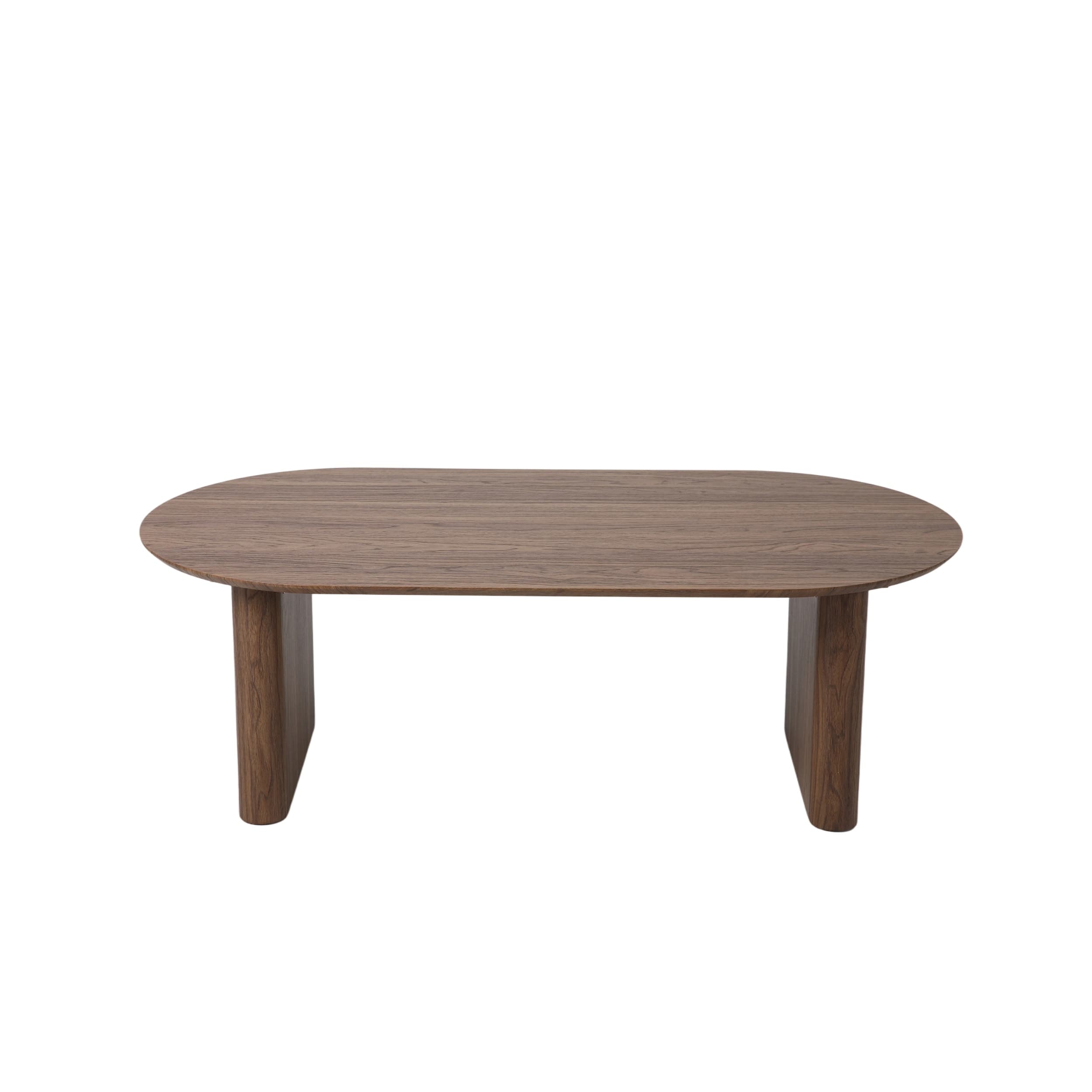 An oval-shaped coffee table crafted from dark wood, featuring a minimalist design with a thick tabletop and two solid, rectangular block legs. — 3D model