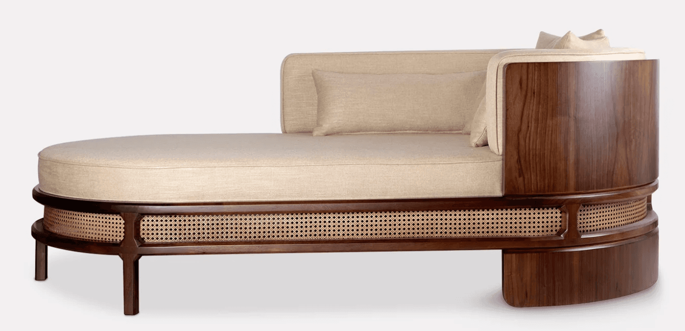 An elegant single-armed chaise lounge featuring a dark walnut wood frame with intricate cane webbing… — 3D model