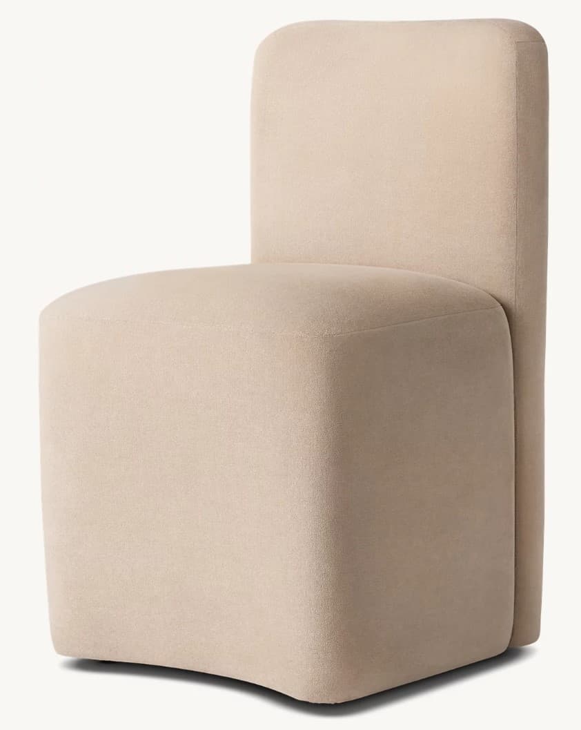 A contemporary upholstered chair with a clean, minimalist design. The chair features a squared-off seat and a tall, slightly curved backrest that seamlessly integrates with the seat structure. The upholstery appears to be a soft, textured fabric. — 3D model