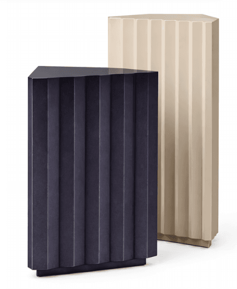 A set of two accent cabinets with a triangular profile. The front panels of both cabinets feature vertical fluting. The cabinet in the foreground is a deep indigo color, while the cabinet in the background is a light beige. Both cabinets are supported by a dark plinth base. — 3D model