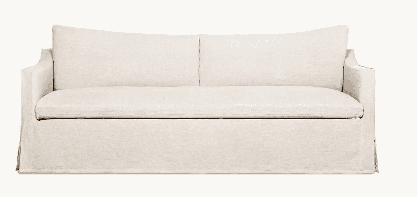A contemporary two-seater sofa with a full slipcover in a light, neutral fabric, featuring a single… — 3D model