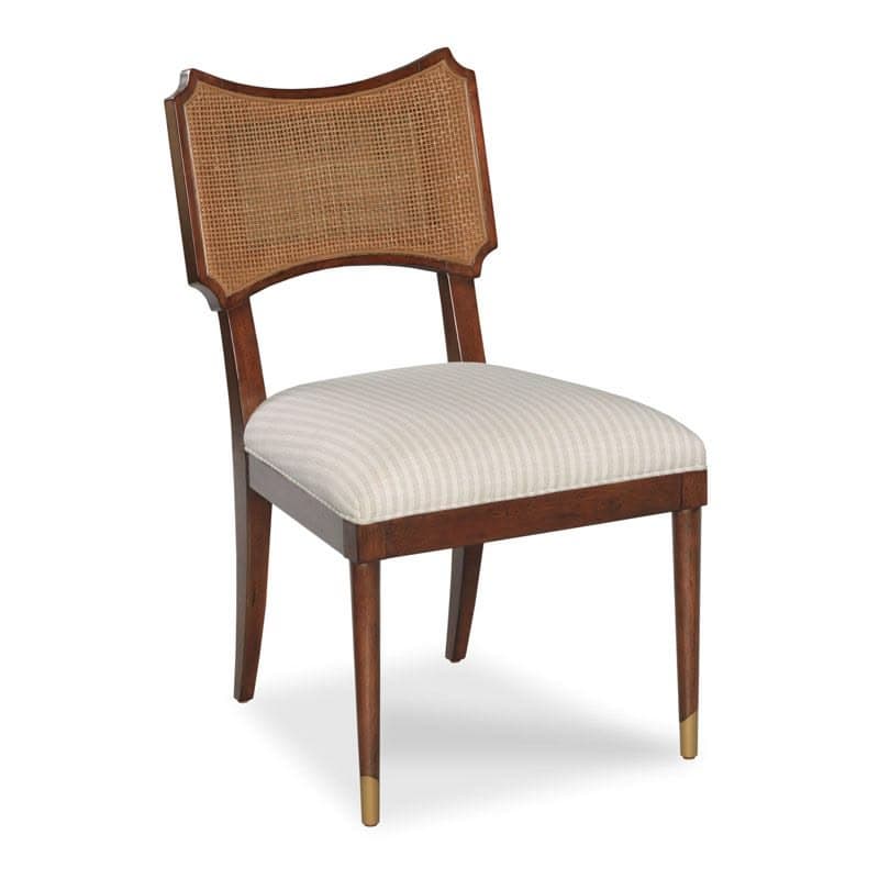 A dining chair featuring a wooden frame with a cane-woven backrest and a upholstered seat. The backrest has a distinctive curved, shield-like shape with decorative wooden trim. The seat is covered in a fabric with thin, alternating light and dark stripes. The chair has four tapered legs, each accented with a brass or gold-toned cap at the bottom. — 3D model