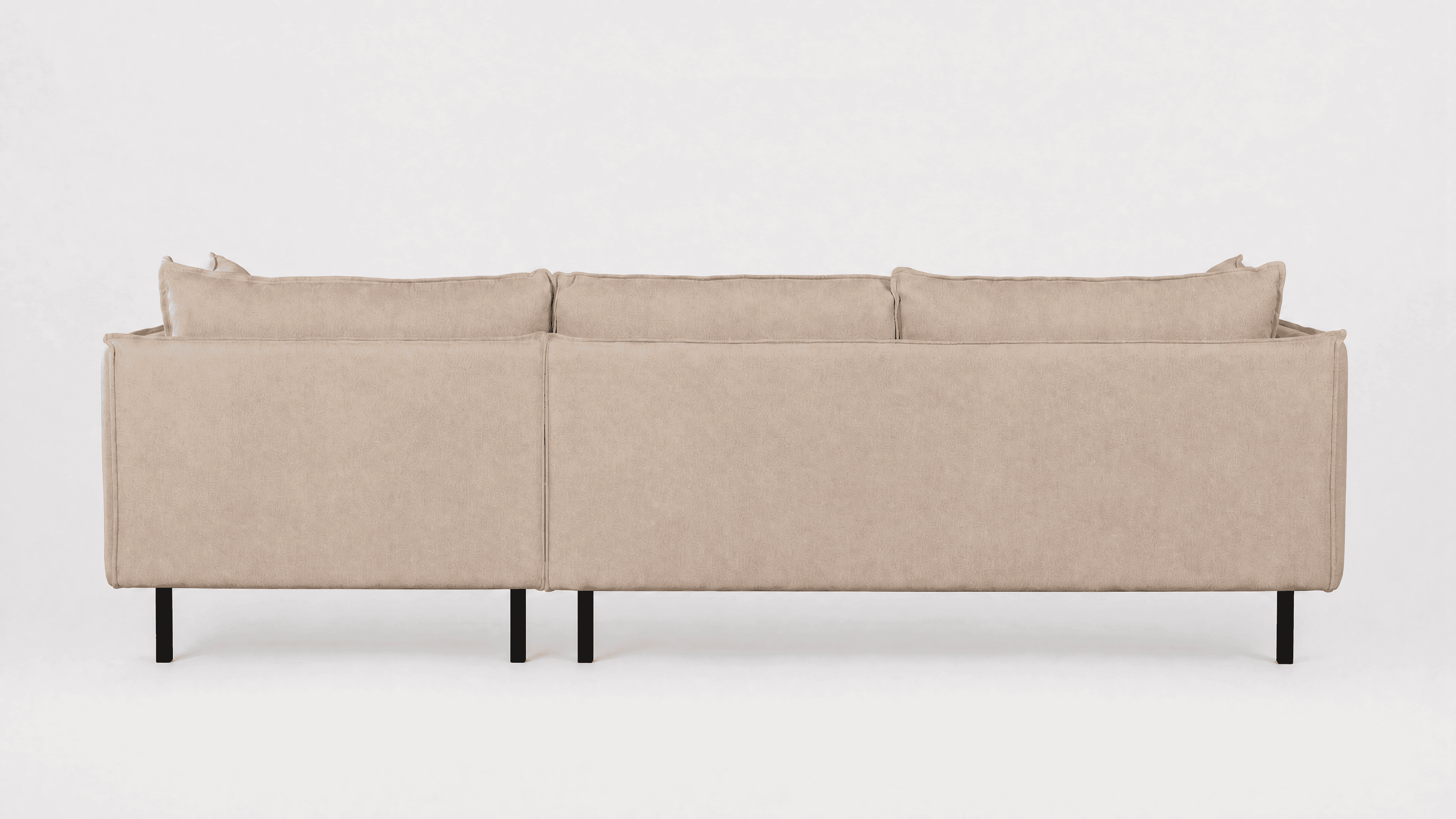 A contemporary sectional sofa, seen from the rear and side, upholstered in light beige/greige fabric… — 3D model