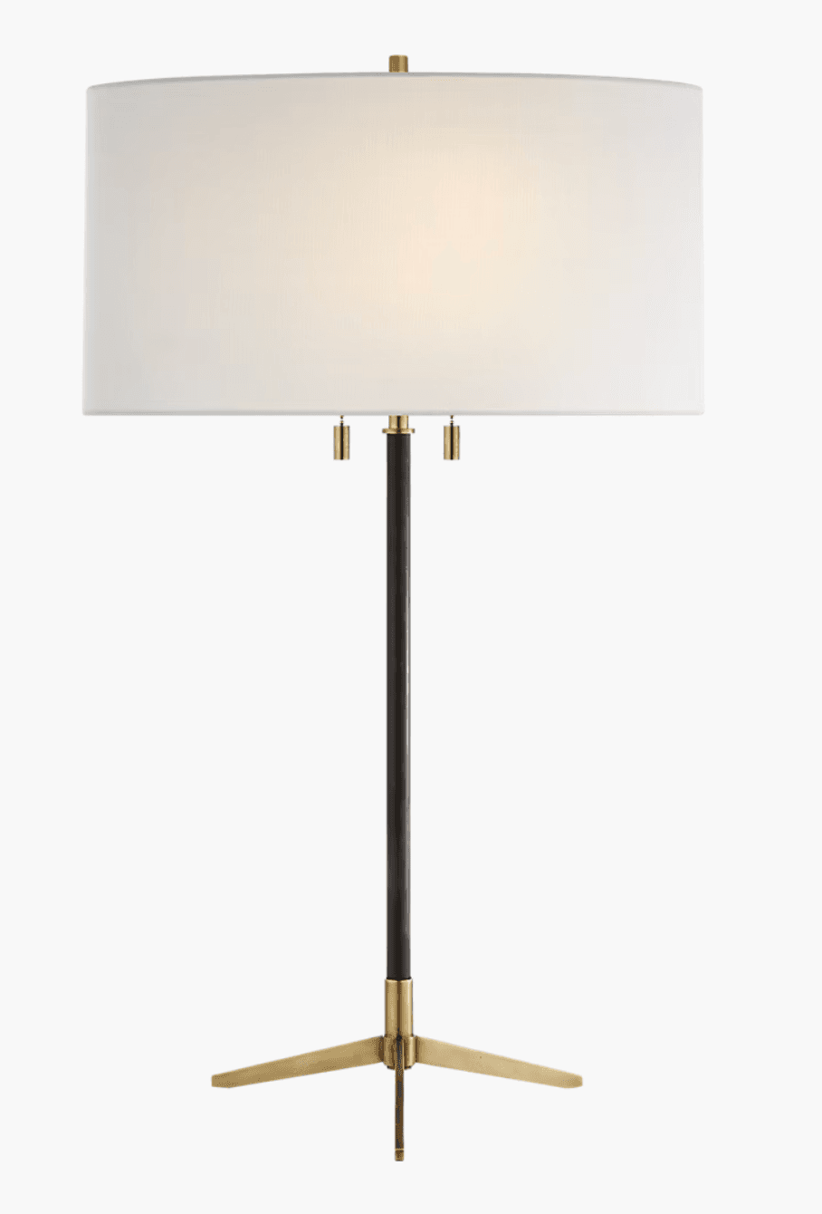 A table lamp featuring a white fabric drum shade supported by a slender, dark-colored column. The column is accented with brass hardware, including pull chains for the light. The lamp stands on a tripod base with brass legs. — 3D model