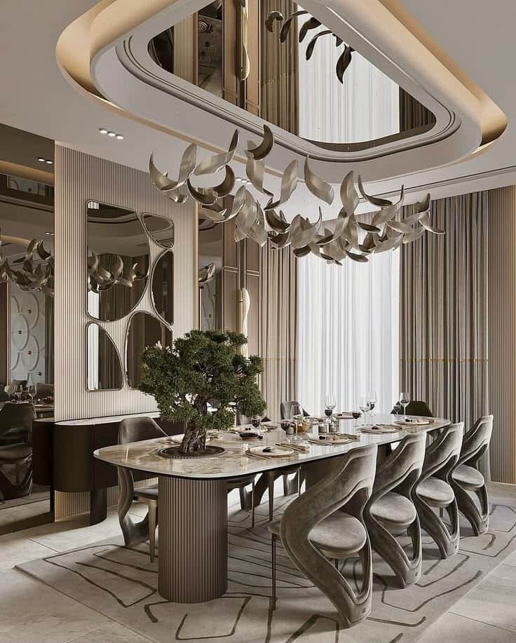 A contemporary dining set featuring a large racetrack-shaped dining table with a white marble top an… — free GLTF 3D model